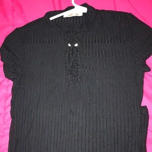 Black bodycon dress with a cut out in front